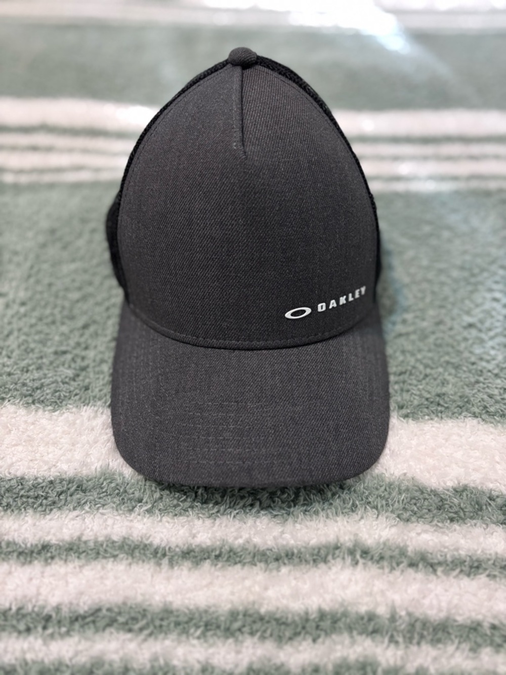 Oakley Black Curved-Brim Trucker Cap with White Logo
